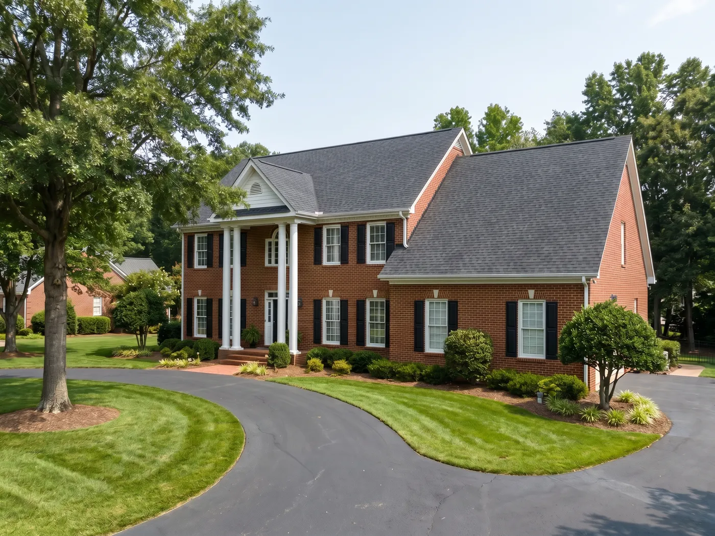 Before and after of an aged builder-grade roof upgraded to designer architectural shingles on a Preston home in Cary, NC